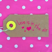 Timbro in legno "L'amore è nell'aria"